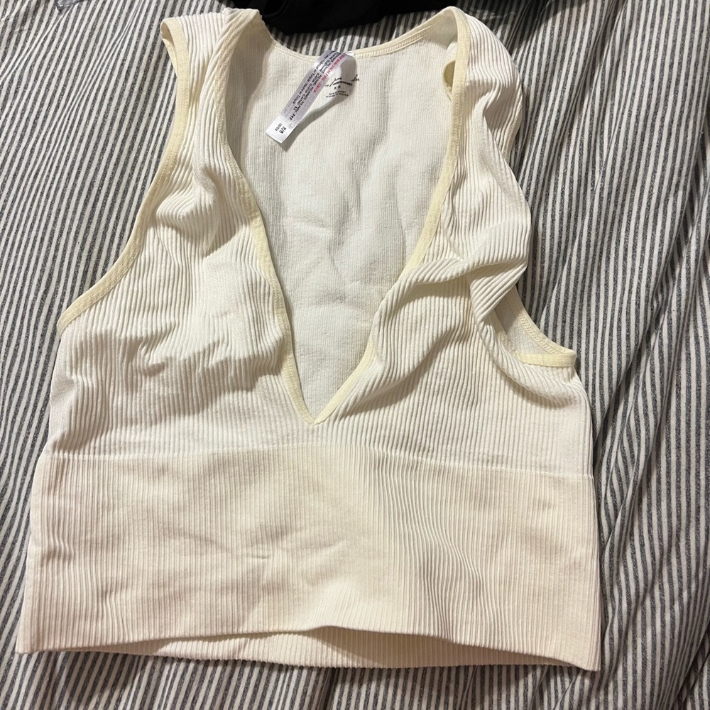 Out from under deep v ribbed tank